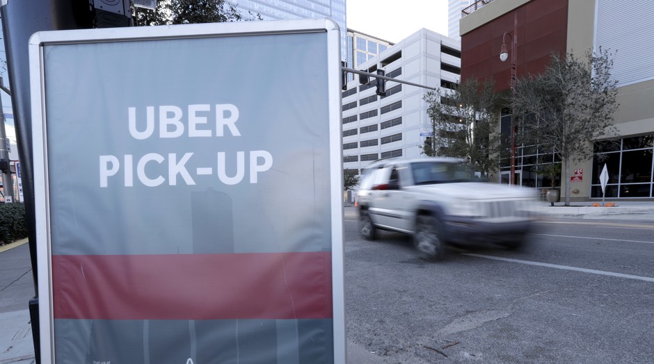 An Uber pick-up location in downtown Houston in 2017.