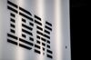 A logo of International Business Machines Corp. (IBM) sits on their offices in London, U.K.