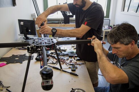 Aerobo employees assemble a drone inside the Aerobo facility in Brooklyn, New York. Photographer: Michael Nagle/Bloomberg