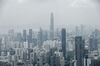 The Ping An International Finance Center (Ping An IFC), center, stands among commercial and residential buildings in Shenzhen, China, on Wednesday, Sept. 20, 2017. China is on a city-by-city campaign to rein in house prices and limit the risk of bubbles.