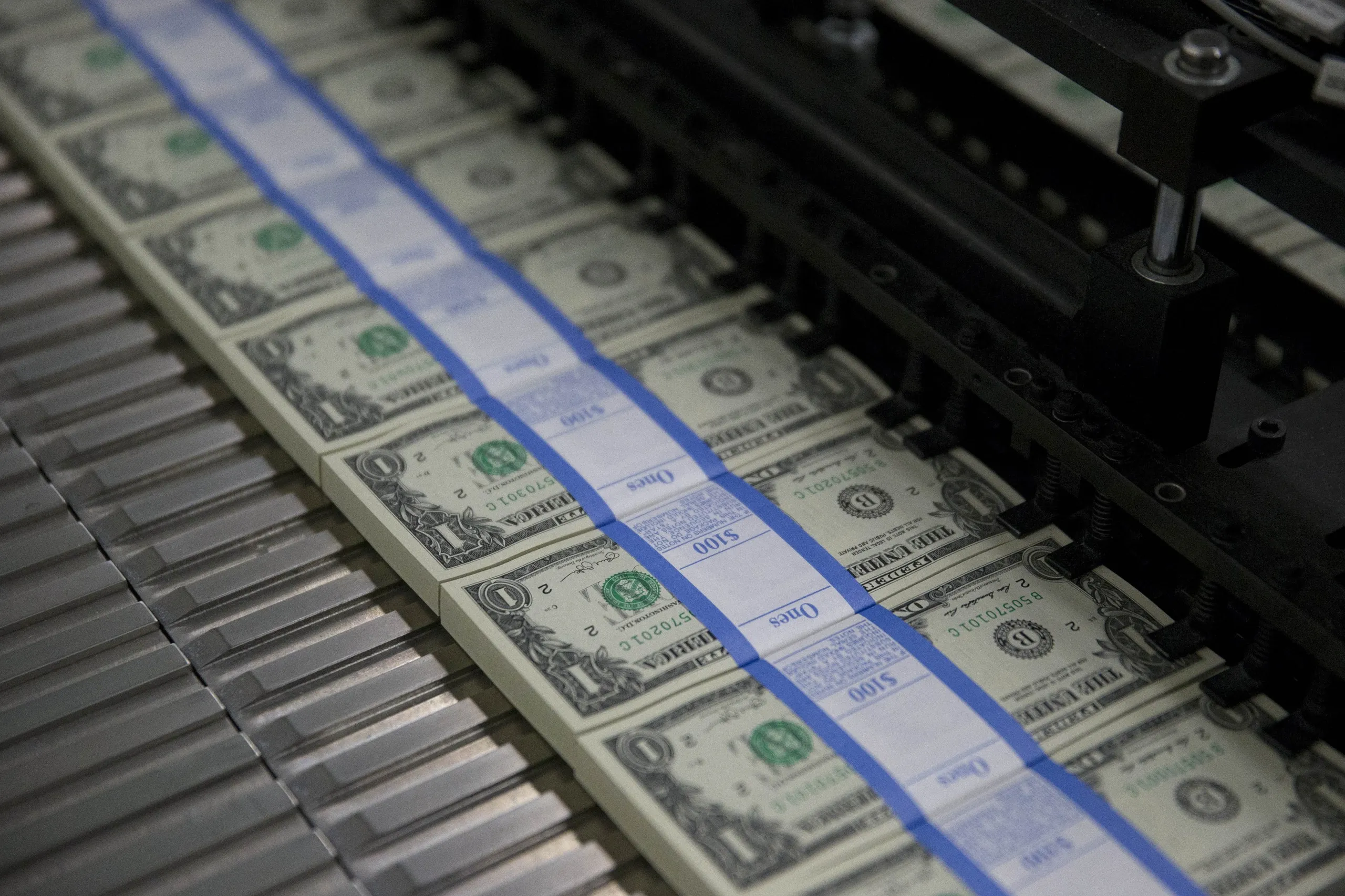 Operations At The Bureau Of Engraving And Printing As The $1 Bill Is Printed