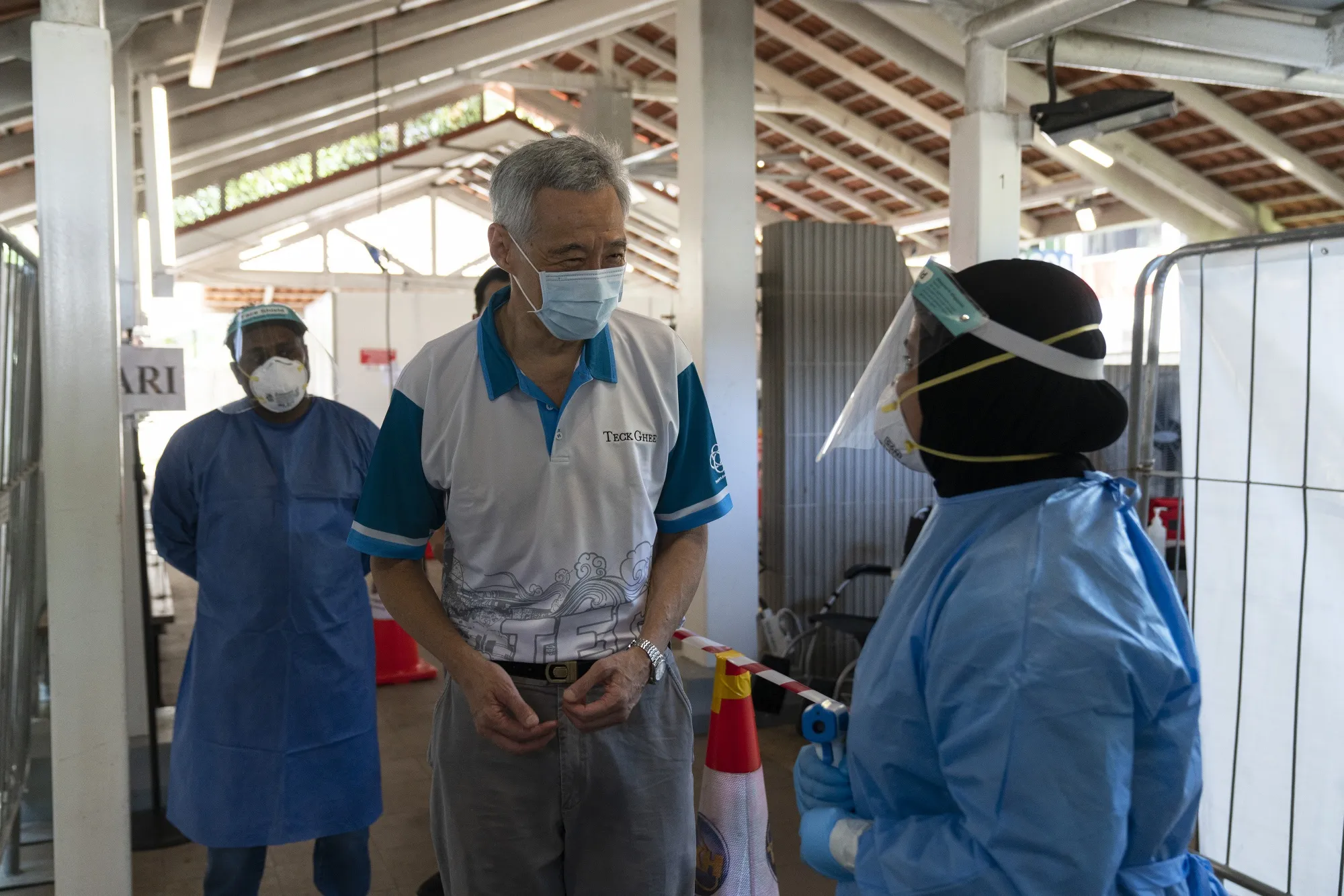 Lee Hsien Loong at a Covid-19 test site set up at a Housing & Development Board (HDB) public housing estate in the Ang Mo Kio area of Singapore, earlier in July.