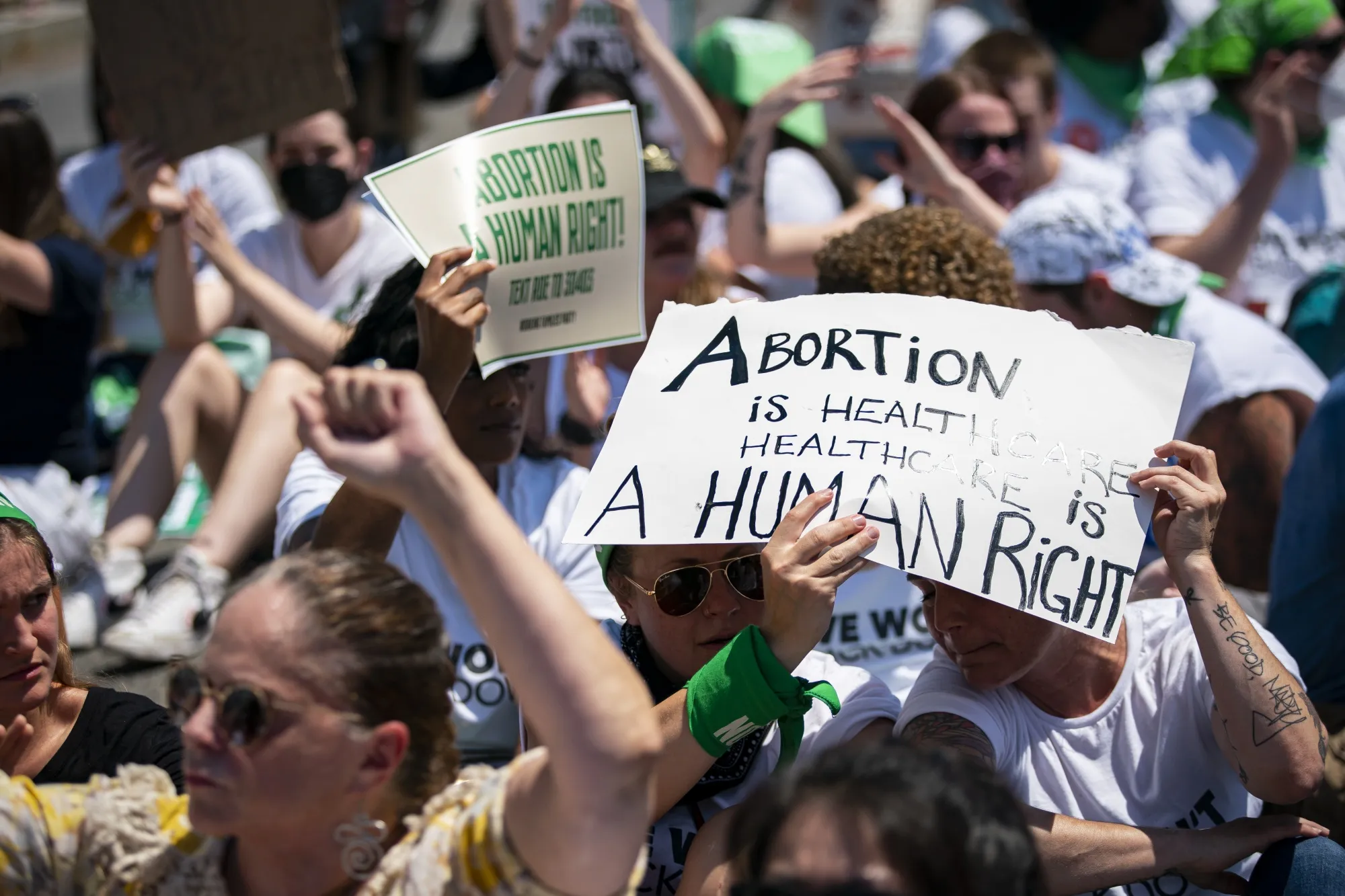 Abortion rights demonstrators block an intersection during a protest near the US Supreme Court in Washington, D.C., on June 30.