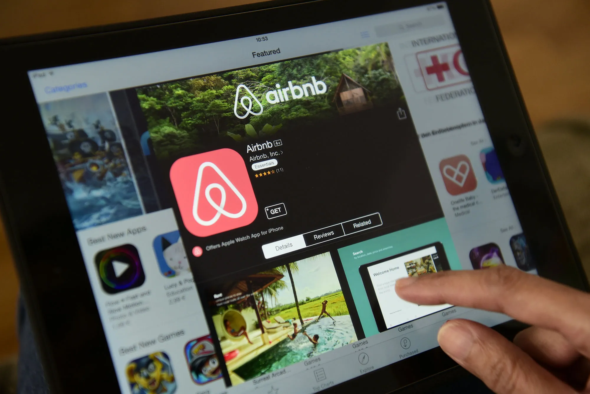 A woman browses the site of US home sharing giant Airbnb.
