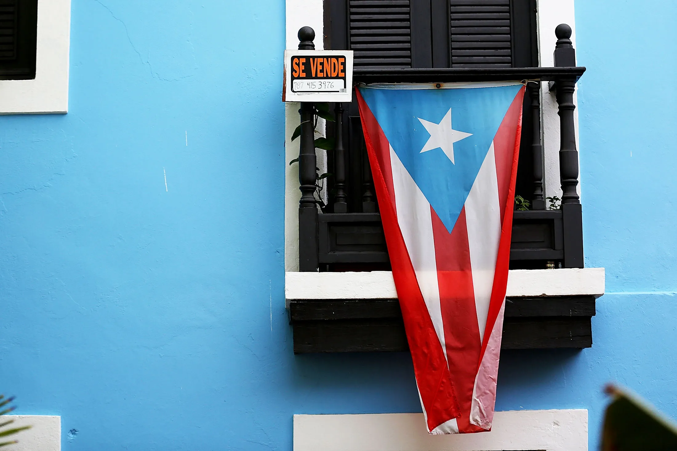 A flag hangs in Old San Juan, Puerto Rico.
