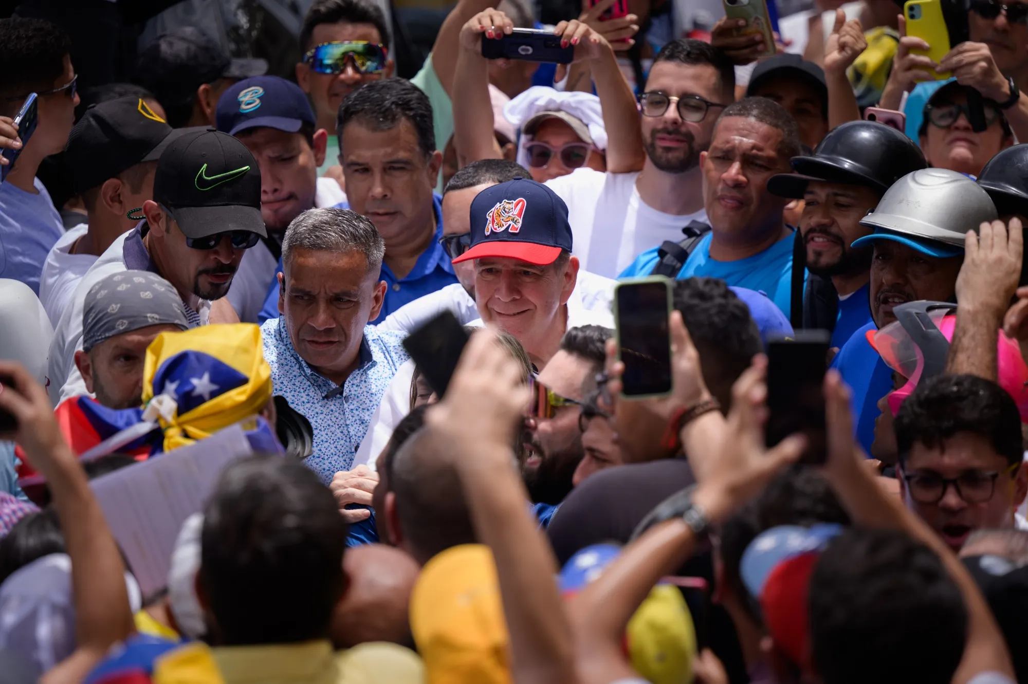 Edmundo Gonzalez, Venezuela’s new opposition candidate, center, greets attendees during a rally in La Victoria, Aragua state, Venezuela.