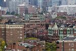 Brownstone buildings are seen from a rooftop near Kenmore Square in Boston, Massachusetts, U.S.,