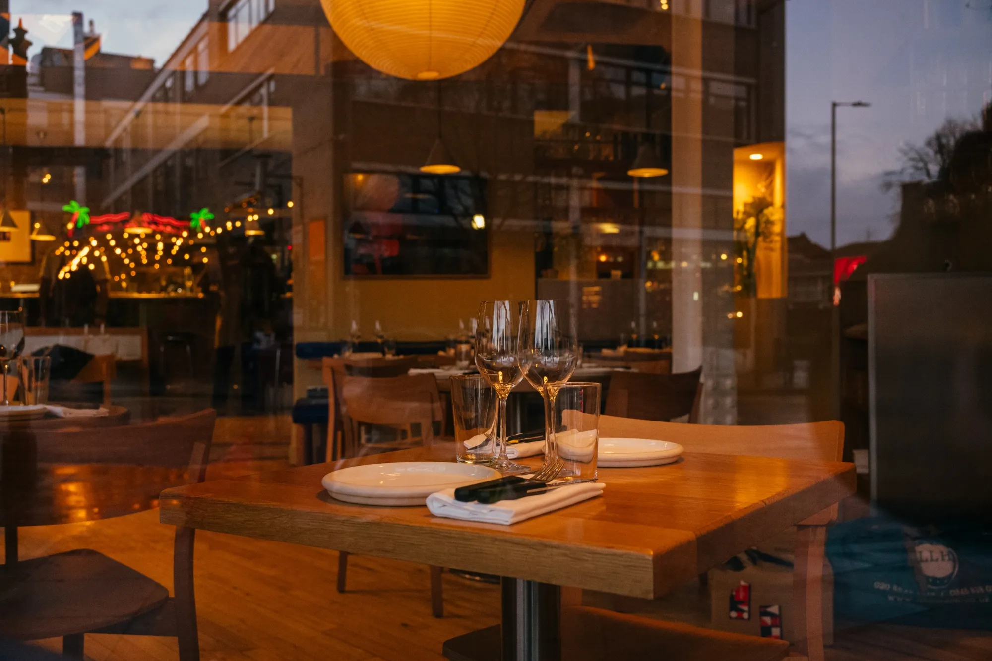 Tables ready for customers inside a London restaurant.
