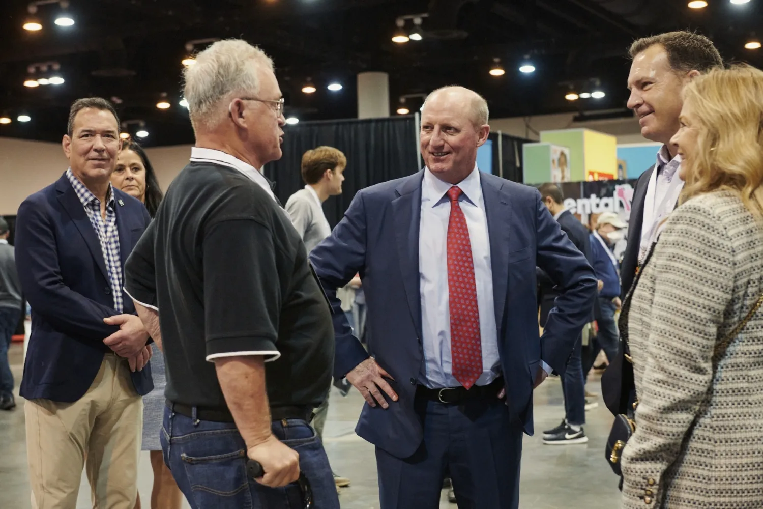 Greg Abel, center.