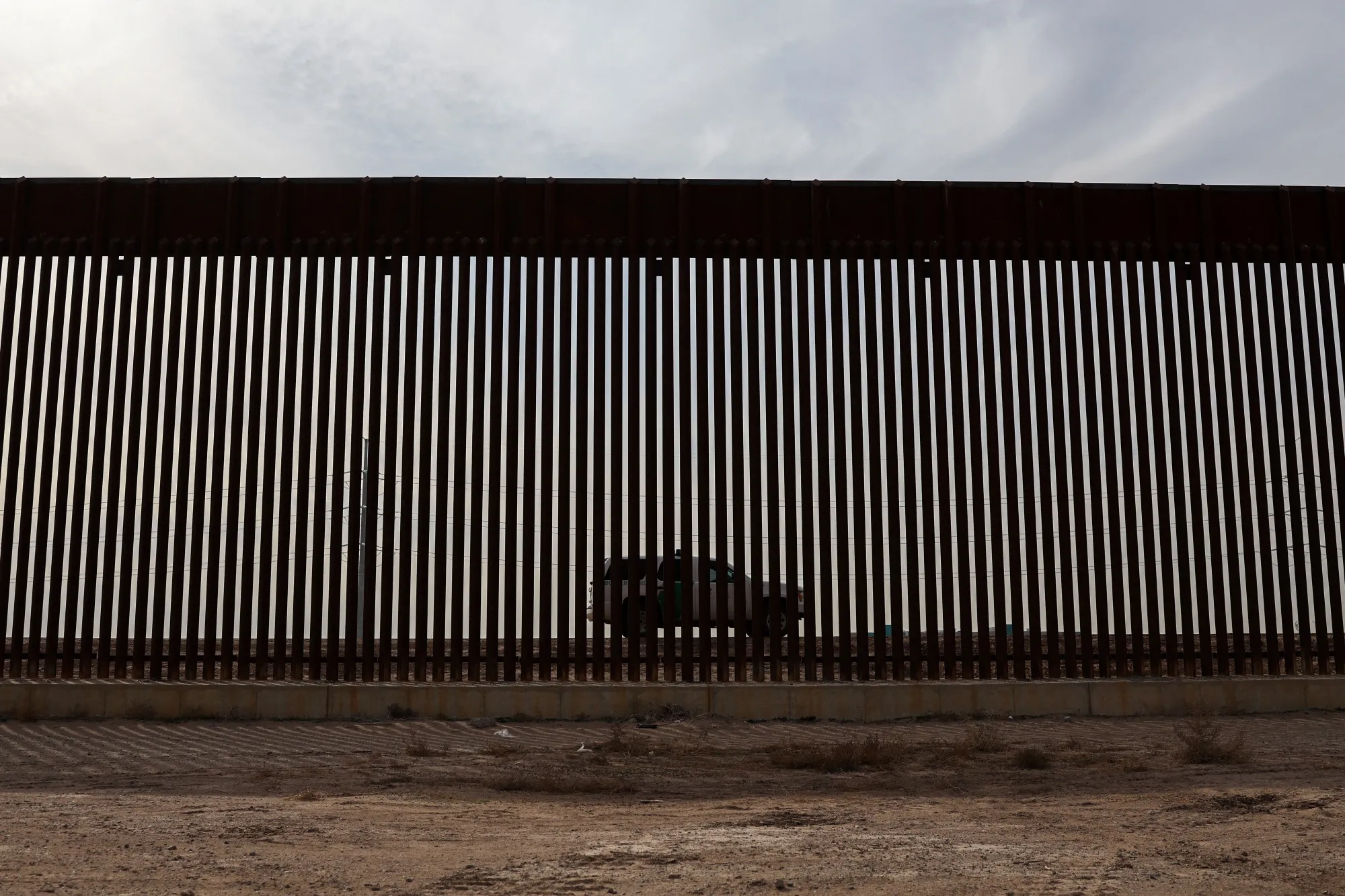 A Customs and Border Protection vehicle patrolling along the US-Mexico border in El Paso.