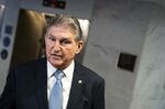 Senator Joe Manchin, a Democrat from West Virginia, speaks to members of the media outside of his office on Capitol Hill in Washington, D.C., U.S., on Monday, Dec. 13, 2021. Lawmakers aim to vote this week to raise the debt limit enough to get past the 2022 midterm elections, and they appear to have a clear path after striking a bipartisan deal last week on a related procedural bill.