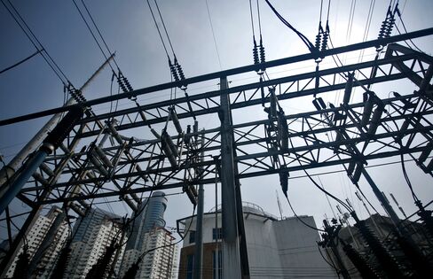 First Pacific Mulls Buying San Miguel’s Manila Electric Stake