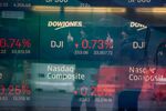 Monitors display stock market information at the Nasdaq MarketSite in New York, U.S., on Friday, Jan. 28, 2022.