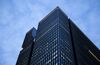 The Mizuho Financial Group Inc. headquarters stands at dusk in Tokyo.