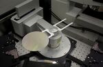 A Gallium Arsenide semiconducting wafer is processed into chips for radio frequency communications devices at RF Micro Devices Inc. (RFMD) headquarters in Greensboro, North Carolina, U.S., on Wednesday, Feb. 15, 2012.