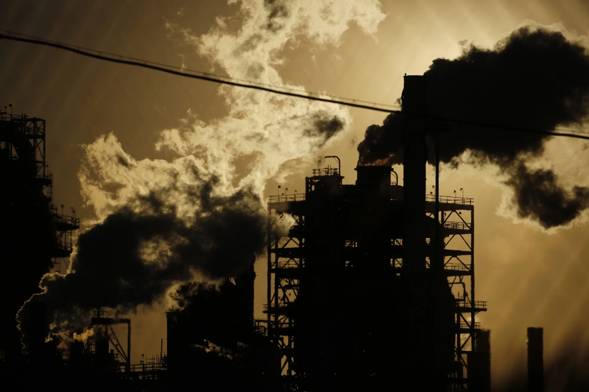 Emissions rise from an oil refinery in Norco, Louisiana.
