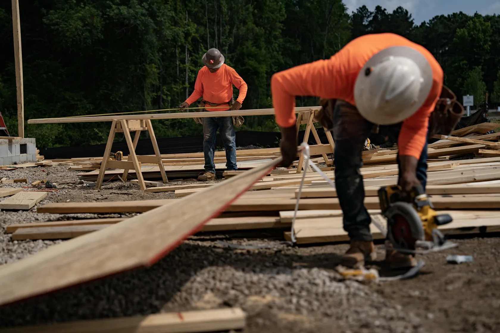 Construction was among the sectors with slowing job growth last month. Above: Homebuilders in Lillington, North Carolina.