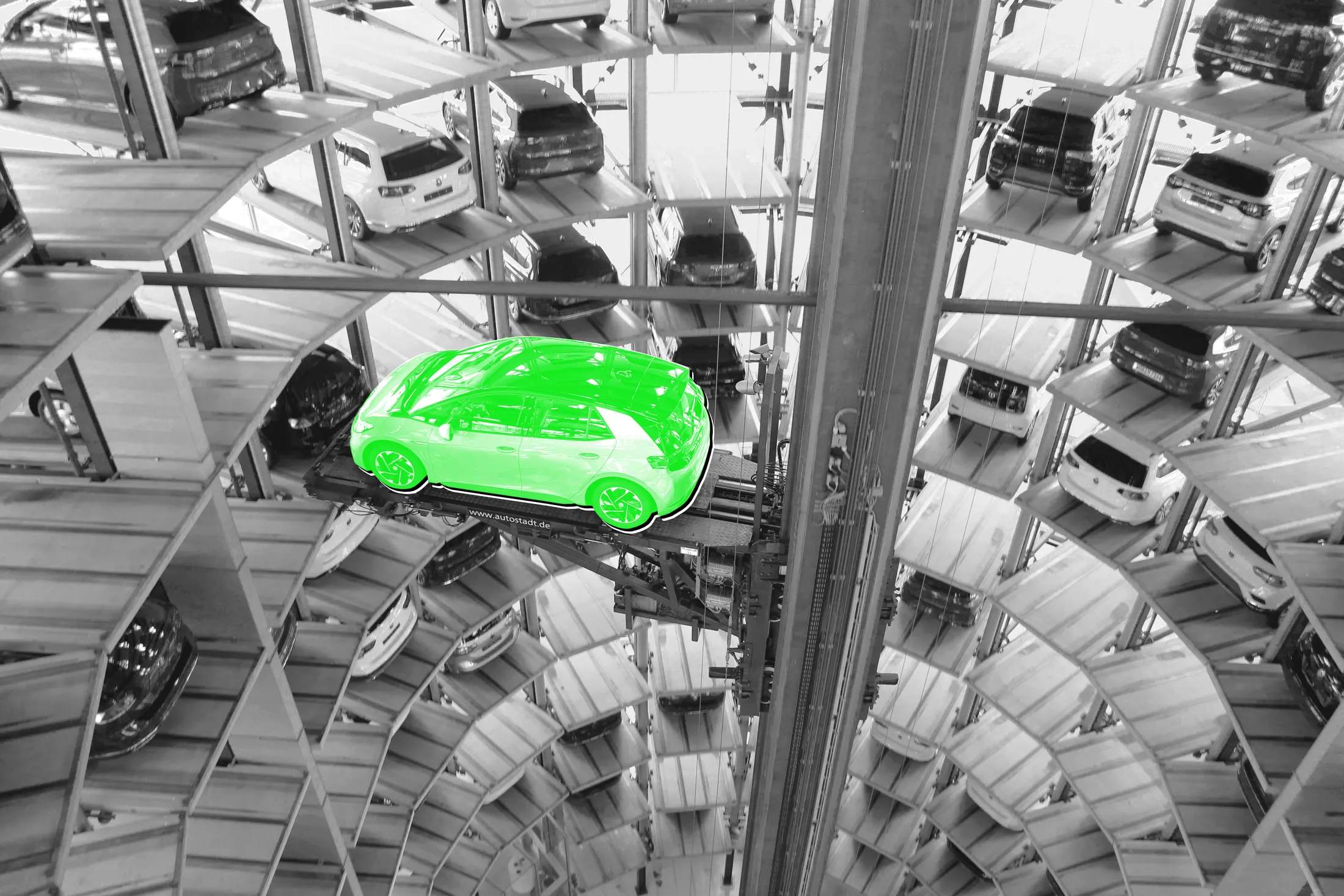 An electric Volkswagen ID.3 inside one of the automaker's Autostadt delivery towers at their headquarters in Wolfsburg, Germany. Volkswagen plans to spend $34 billion&nbsp;boosting its battery production capacity.
