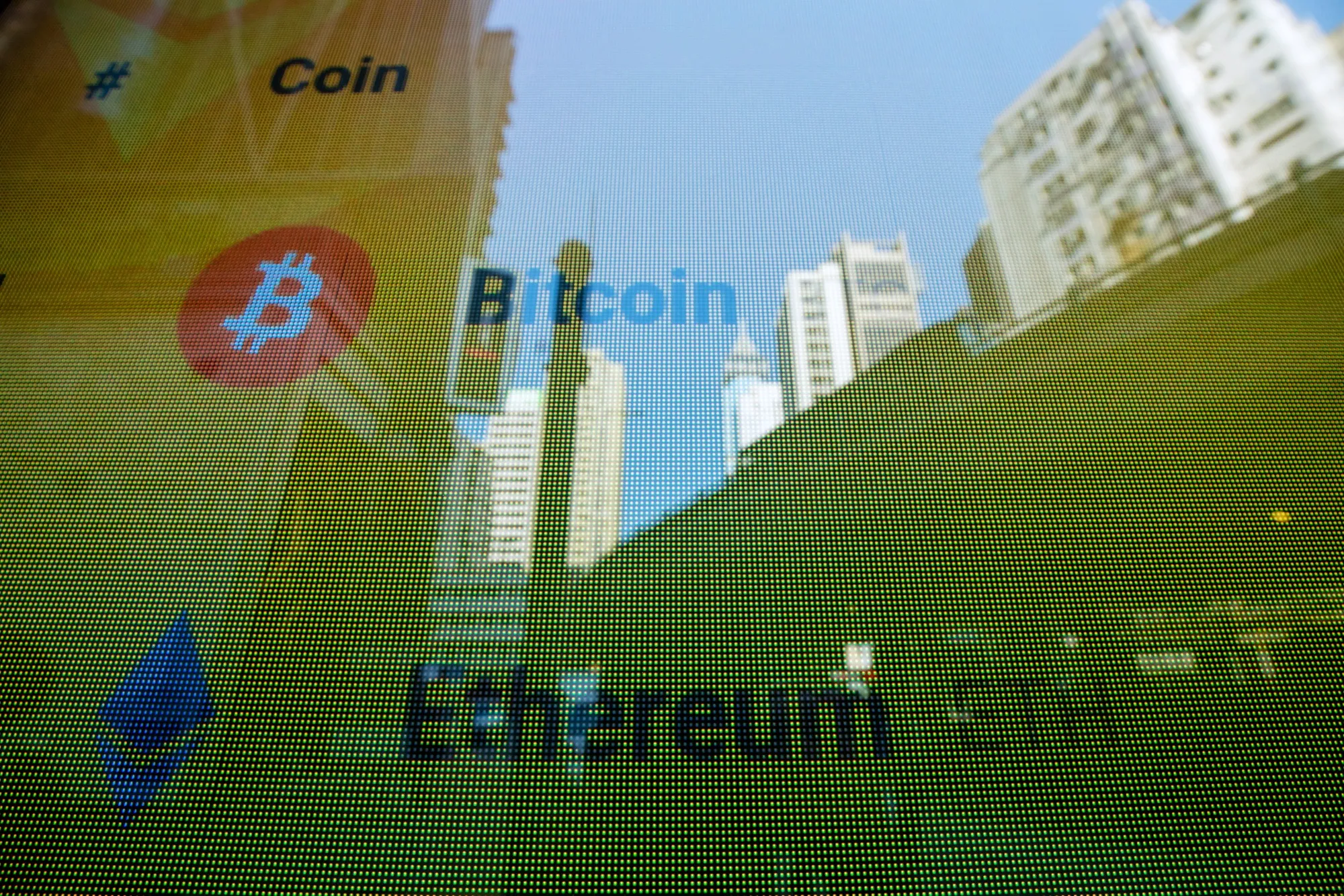 The Bitcoin and Ether logos.