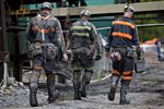 Workers exit a mine entrance during a shift change near Wylo, West Virginia.