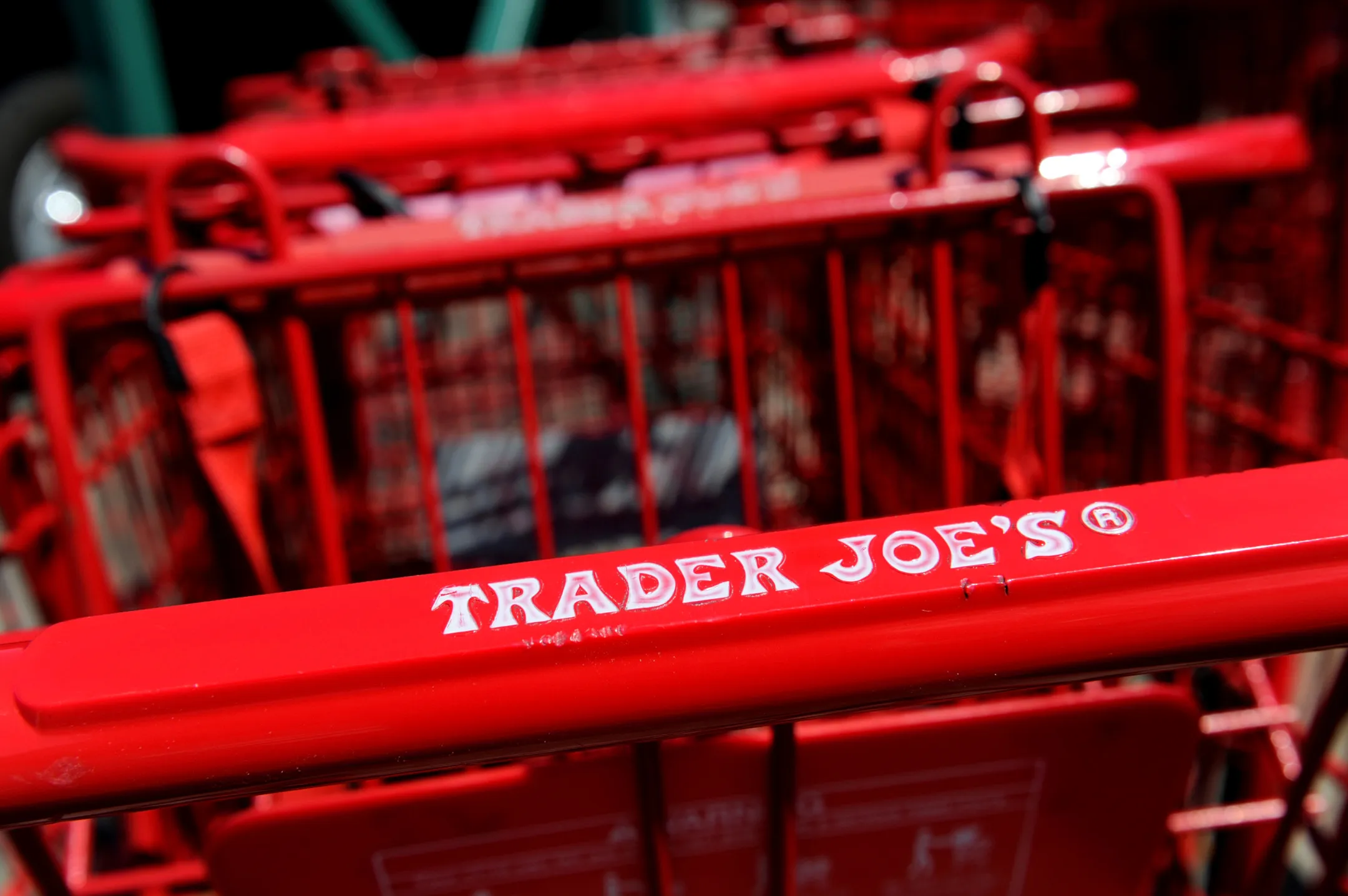Trader Joe's Co. logo is displayed on shopping carts.