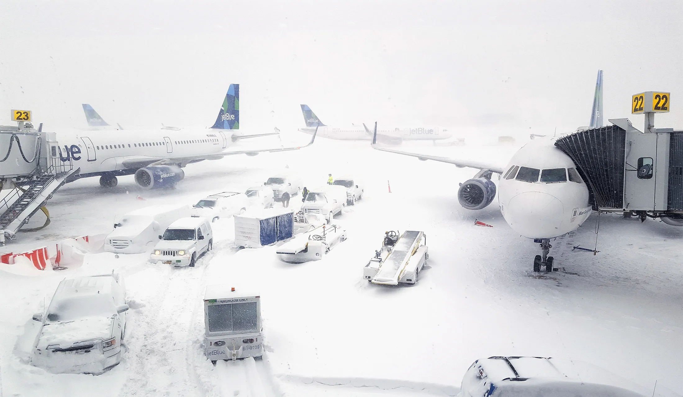 Airplanes wait at the gates outside terminal five at John F. Kennedy International Airport on Jan. 4, 2018.