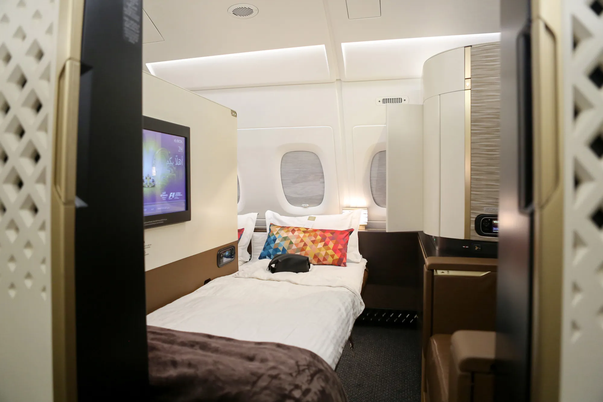 A bed inside a first class cabin of an Etihad Airways passenger aircraft.