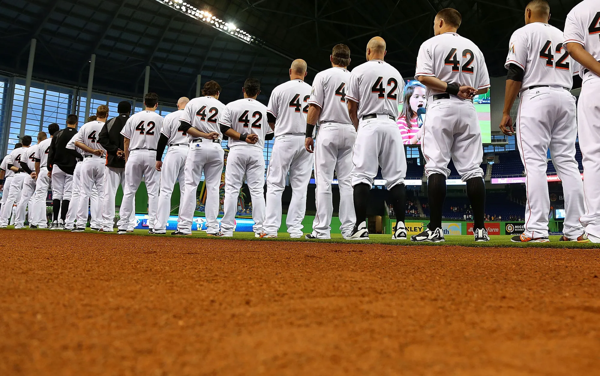 The Miami Marlins line up during a game against the Washington Nationals at Marlins Park on April 15, 2014 in Miami, Florida.
