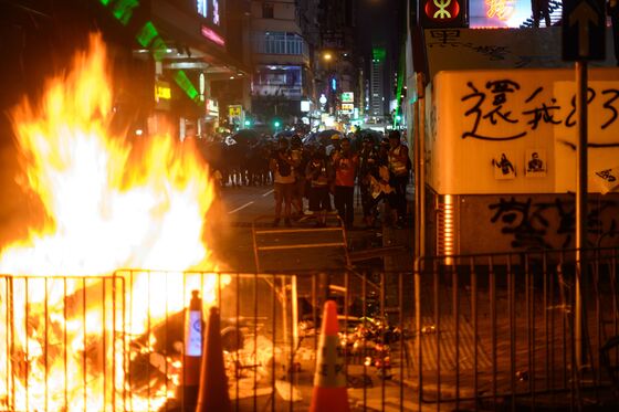 Police Fire Tear Gas, Protesters Start Blazes: Hong Kong Update
