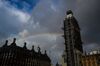 Portcullis House, left, and the Houses of Parliament in London.