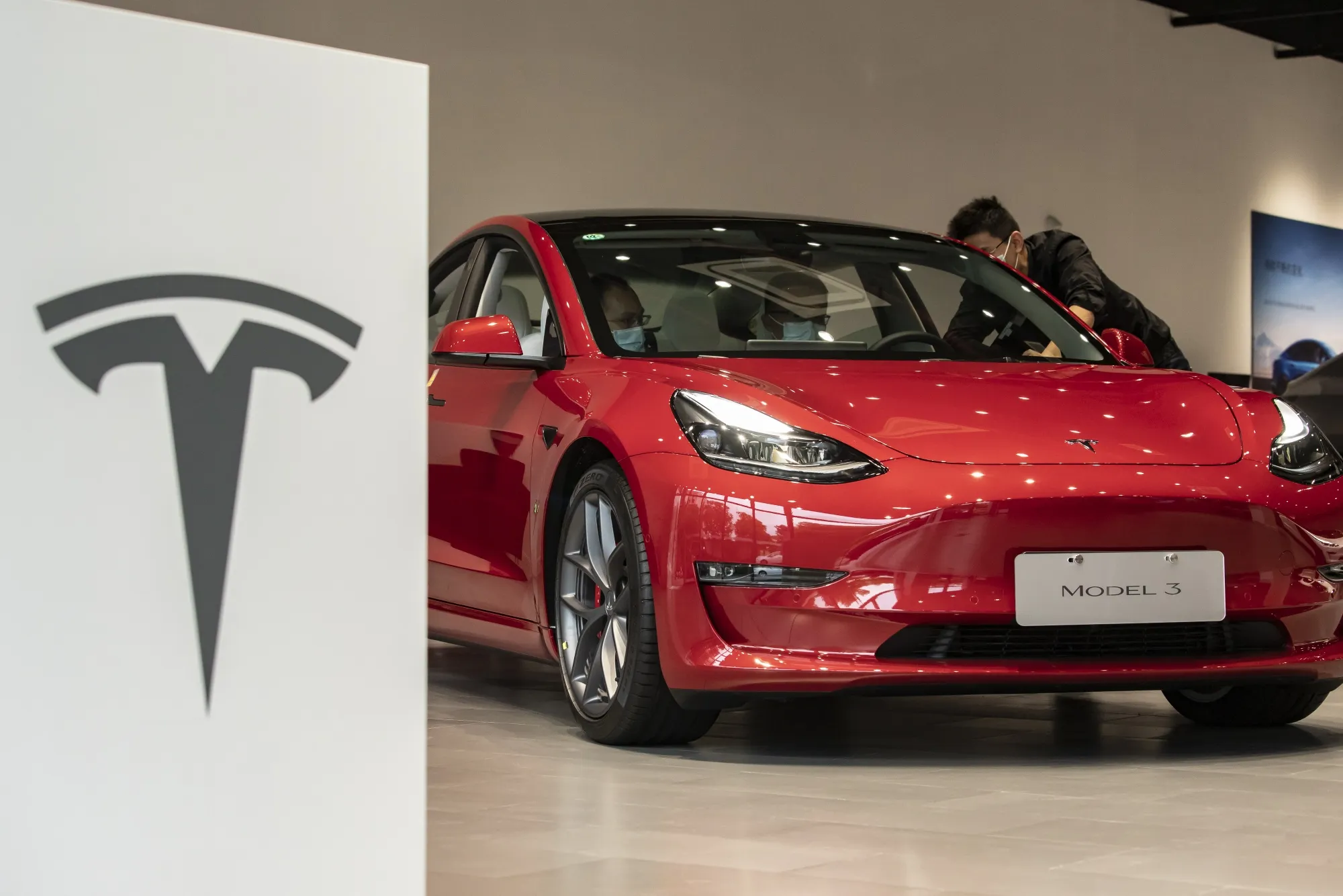Customers at a Tesla&nbsp;showroom in Shanghai.