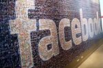 Signage made up of individual faces is displayed inside a Facebook Inc. data center in Prineville, Oregon.