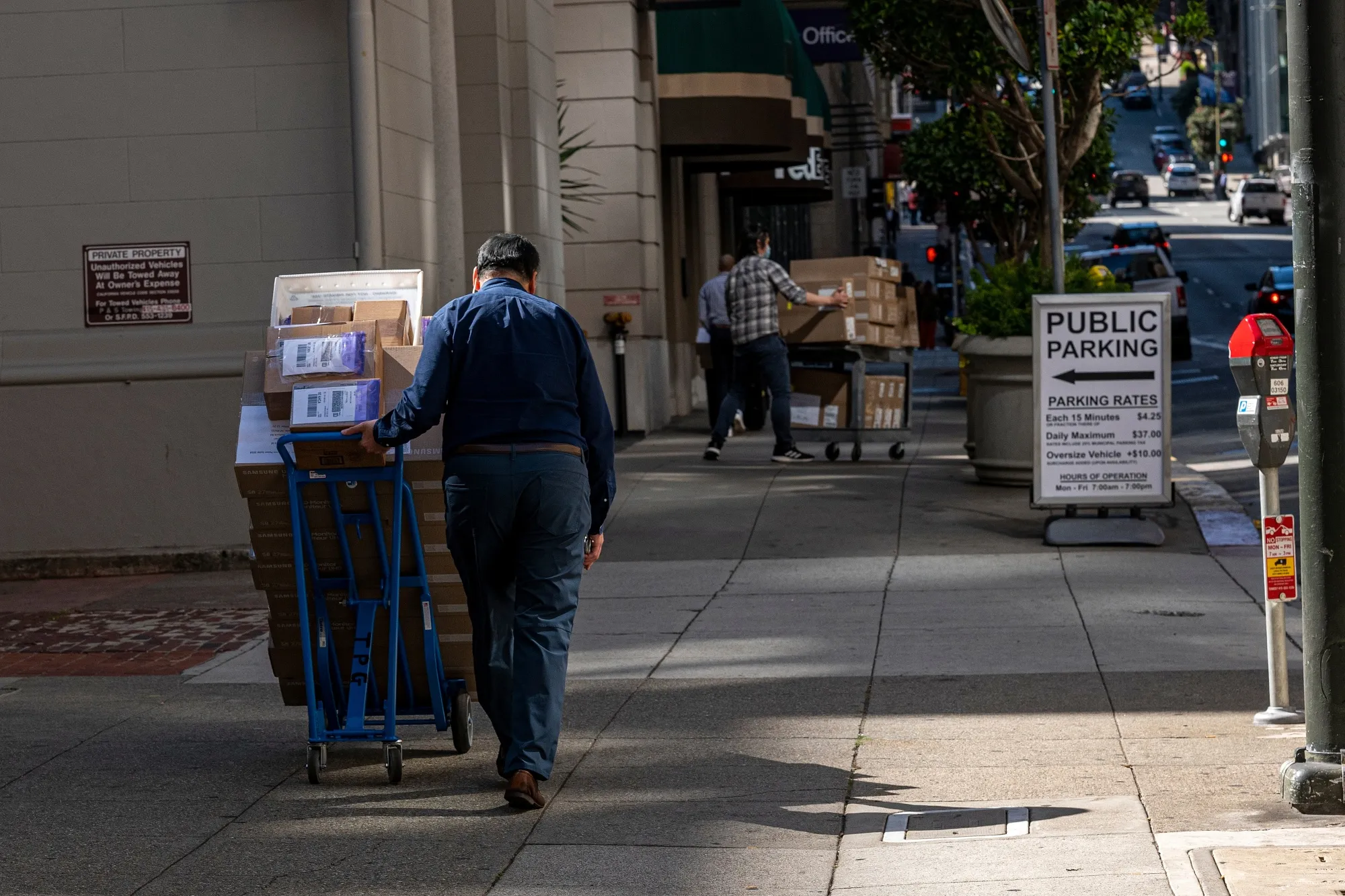 A worker delivers packages&nbsp;in San Francisco, California.