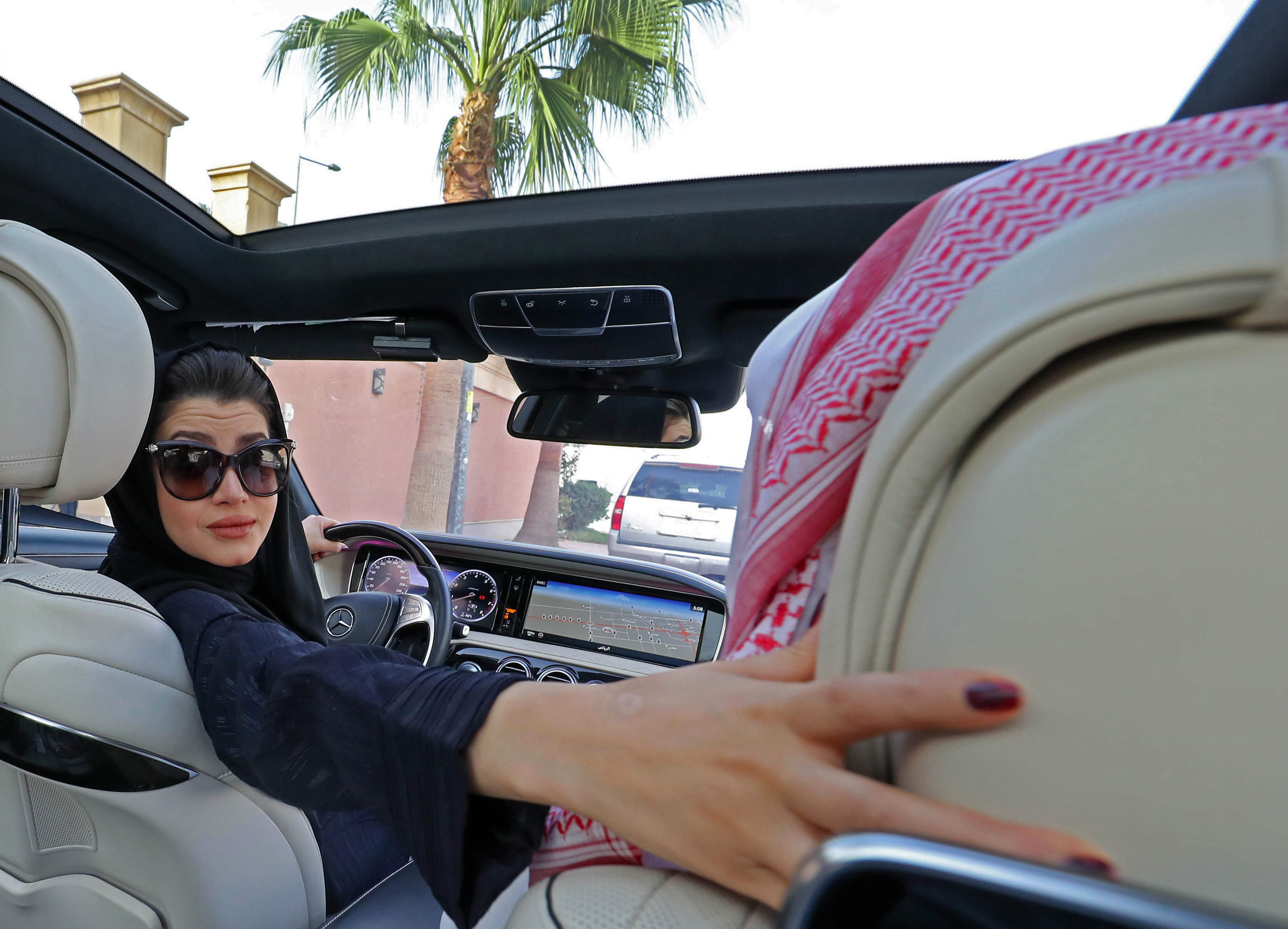 A Saudi woman practices driving in Riyadh in April.