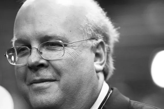 Karl Rove walks on the floor before the start of the second day of the Republican National Convention at the Tampa Bay Times Forum