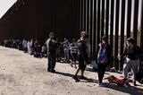 Migrants At U.S.-Mexico Border In Arizona