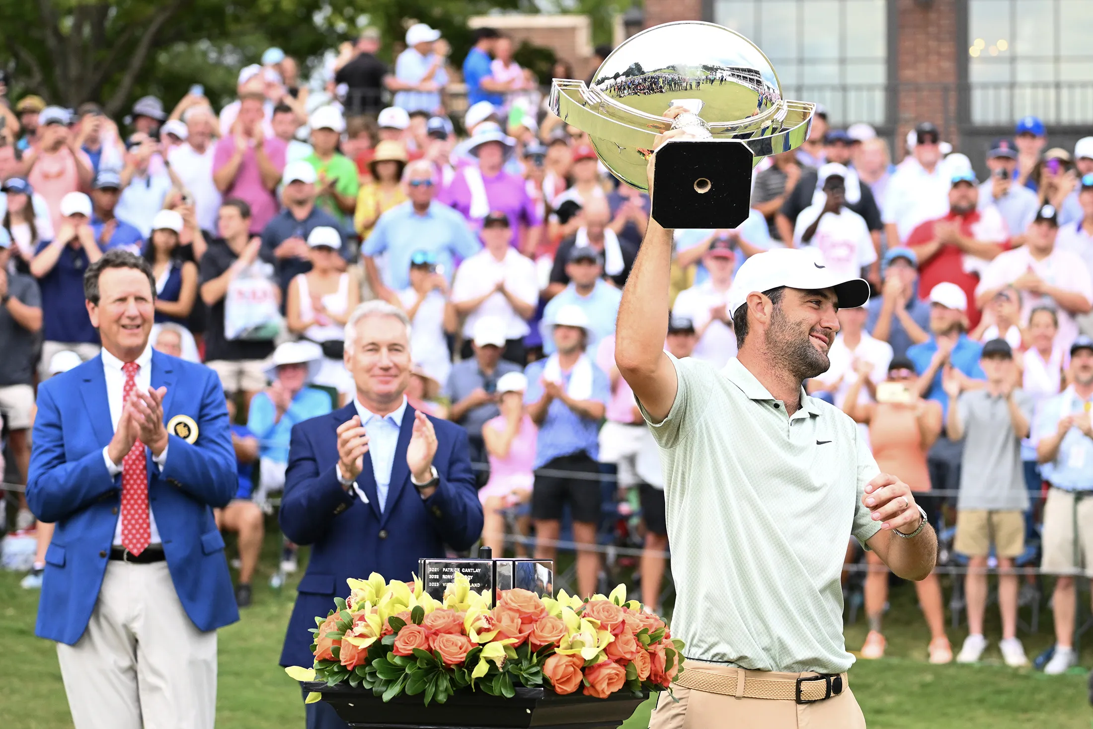 Scottie Scheffler celebrates with the FedEx Cup after winning the TOUR Championship at East Lake Golf Club in Atlanta, Georgia,&nbsp;on Sept. 1.