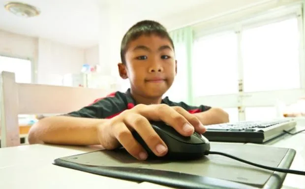 Technology Alone Won't Save Poor Kids in Struggling Schools - Bloomberg