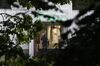A Norwegian riot policeman stands in front of the Al-Noor Islamic Center mosque on Aug. 10.