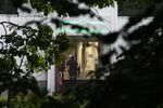 A Norwegian riot policeman stands in front of the Al-Noor Islamic Center mosque on Aug. 10.