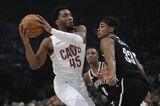 Donovan Mitchell scores season-high 45 points, Cavaliers beat Nets 111-102 in Paris