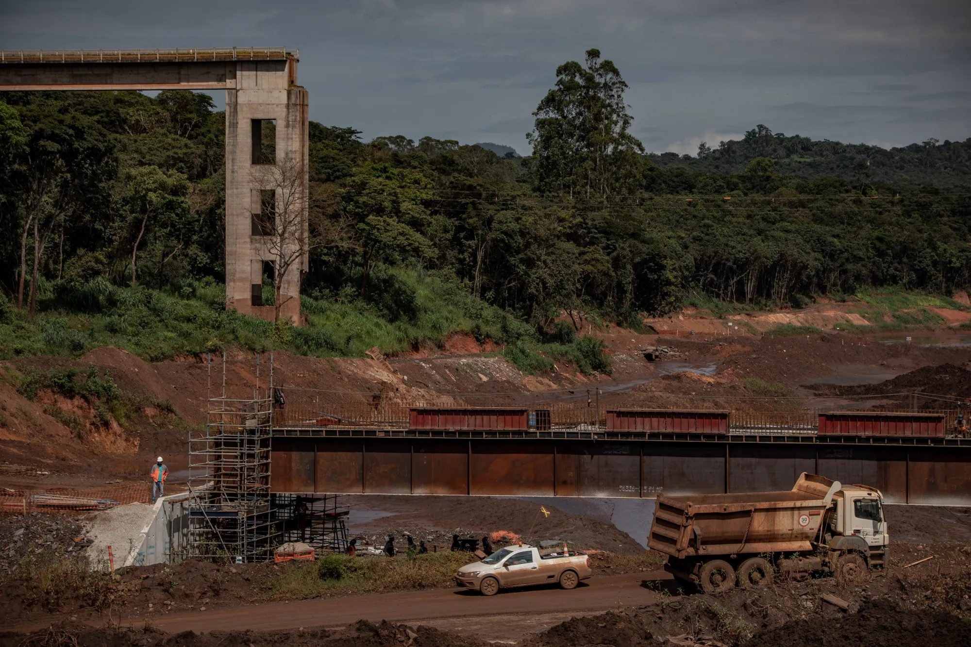 Recovery and repair crews work near a destroyed Vale SA bridge in Brumadinho, Minas Gerais state, Brazil, in Jan 2020.