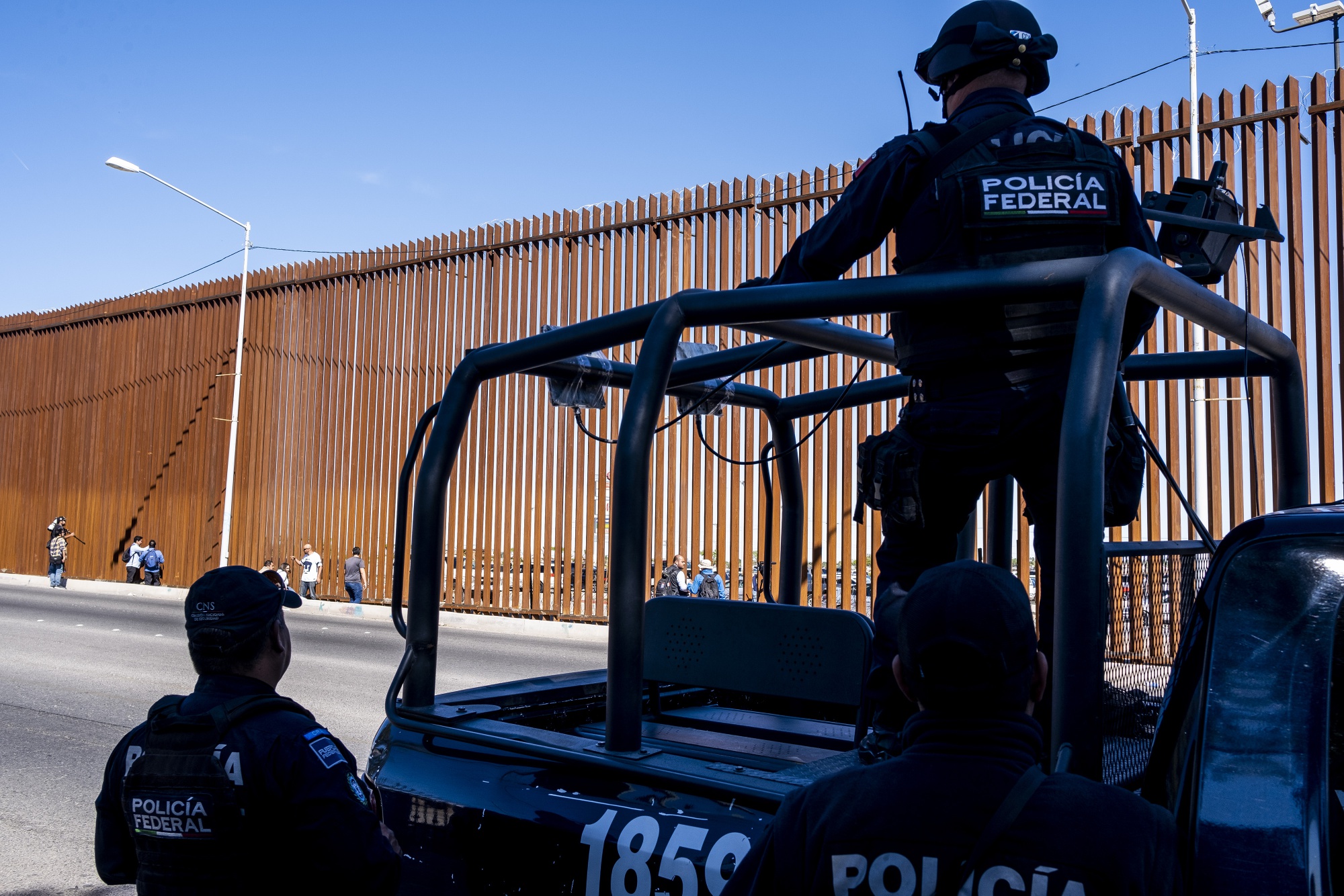 Mexican Federal Police patrol along the U.S.-Mexico border in Mexicali, Mexico.