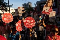 Supporters during a Pheu Thai Party campaign rally in Bangkok, on March 24.
