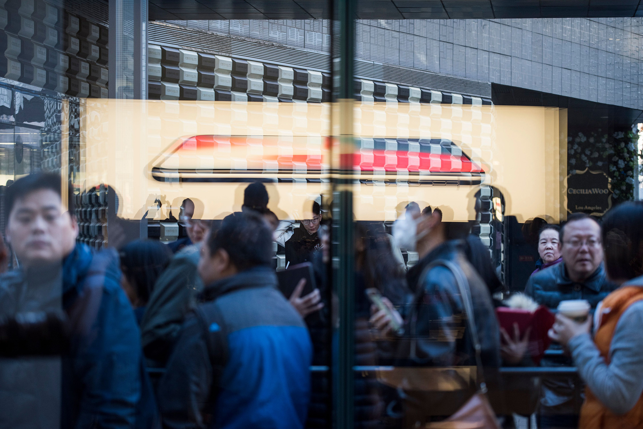 People line up outside the Apple store in Beijing to get their hands on the new iPhone X on Nov.&nbsp;3.