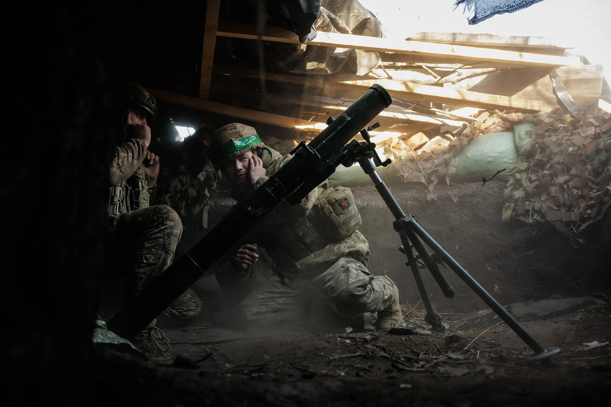 Ukrainian servicemen&nbsp;fire a mortar toward&nbsp;Russian positions near in Toretsk, Ukraine, on Feb. 14.&nbsp;