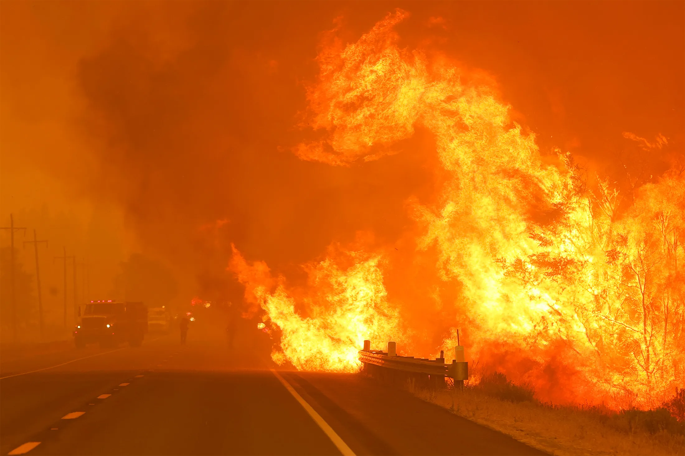 The Dixie Fire burns along Highway 395&nbsp;near Milford, California,&nbsp;on Aug. 17.