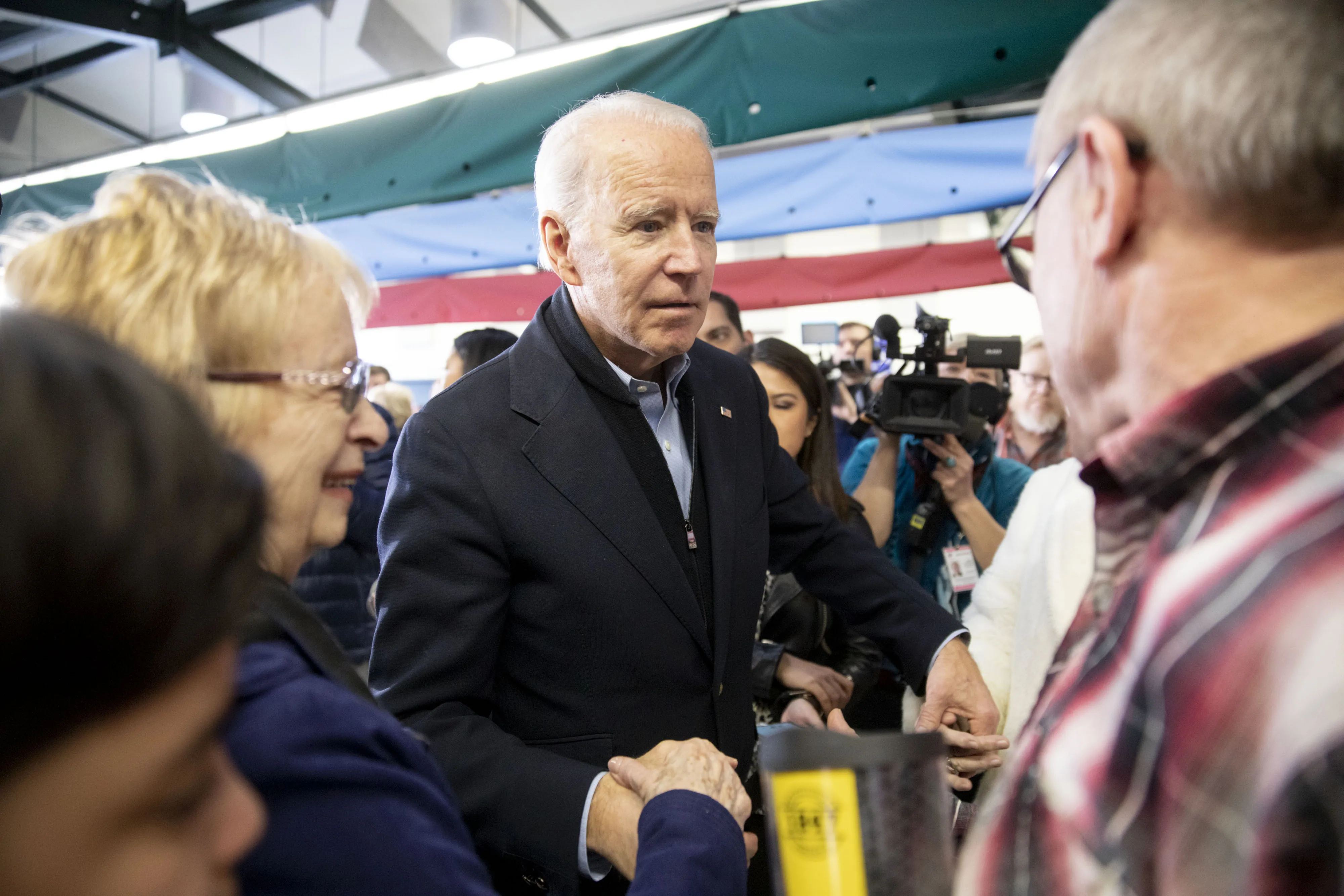 Joe Biden greets attendees during a campaign event in Burlington, Iowa on Jan. 28.
