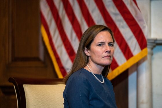 Amy Coney Barrett on Court Seen Handcuffing Agencies’ Climate-Change Fight