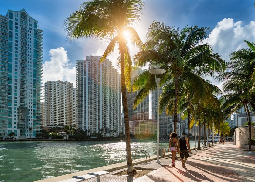 Downtown Miami, people walking along Miami River